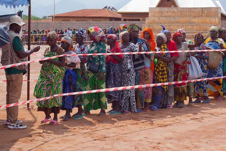 Displaced people wait in line to receive aid from the WFP in South Kivu Province, Democratic Republic of the Congo